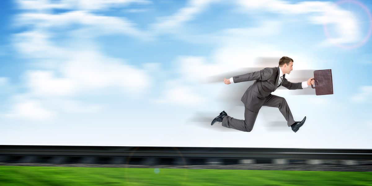 Businessman running away
